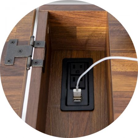 Flip storage, about 12 cm deep. Includes USB socket and 3-hole safety socket.